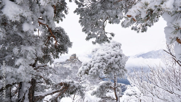 Obraz Image of the Ancient/ Abbey of San Michele built on Mount Pirchiriano located at the entrance of the Susa Valley, around the years between 983 and 987 A.D. with an abundant snowfall