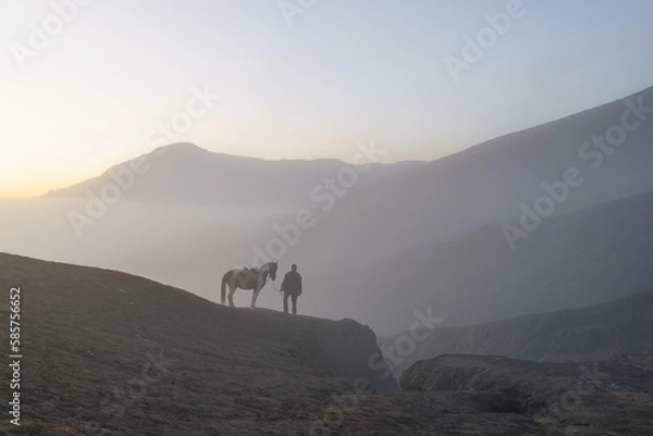 Fototapeta Man with horse in Mount Bromo, East java
