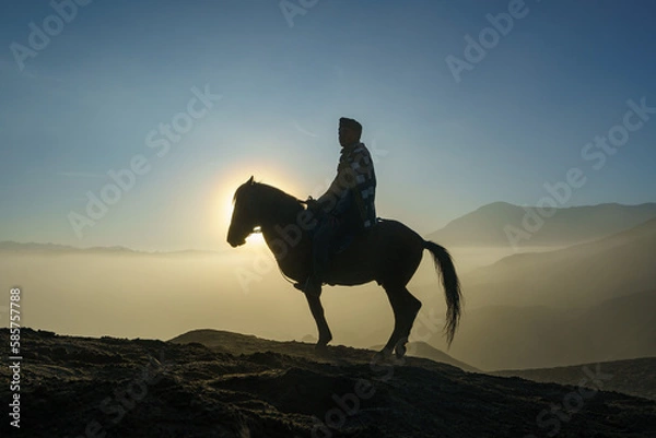 Fototapeta Man with horse in Mount Bromo, East java