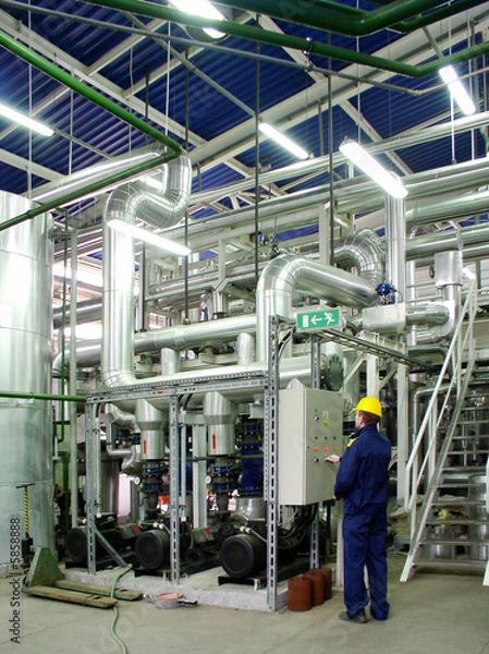 Obraz pipelines and engineer, factory