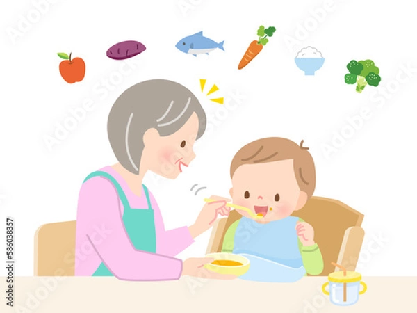 Obraz 赤ちゃんに離乳食を食べさせるシニア女性