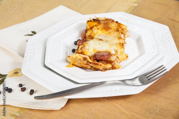 Fototapeta Lasagne con sugo di carne e salsiccia
