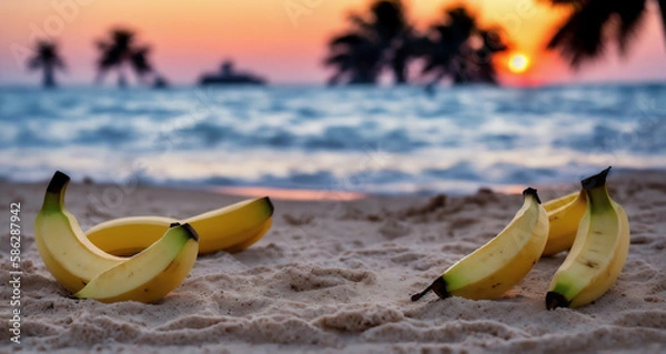 Fototapeta A few large ripe bananas are lying on the sand on the beach .Generative AI