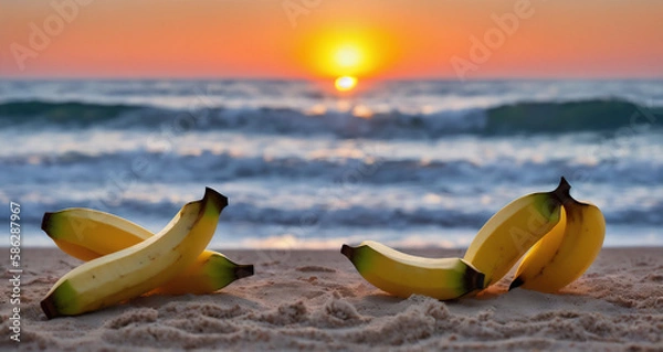 Fototapeta A few large ripe bananas are lying on the sand on the beach .Generative AI