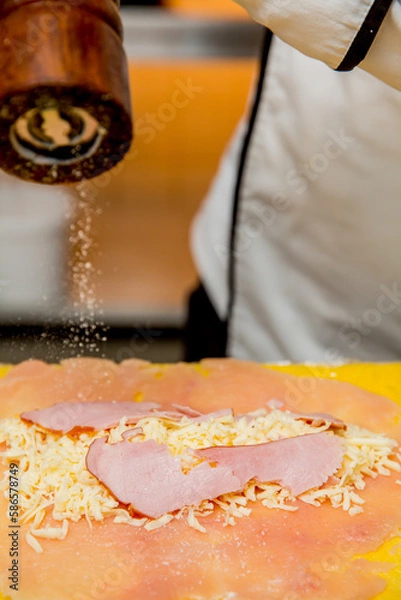 Fototapeta Step-by-step cooking cutlet with cheese and turkey with chicken breading from the chef