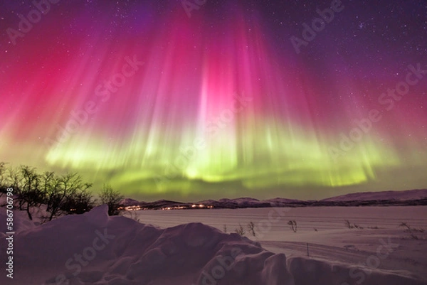 Obraz aurora borealis over the mountains