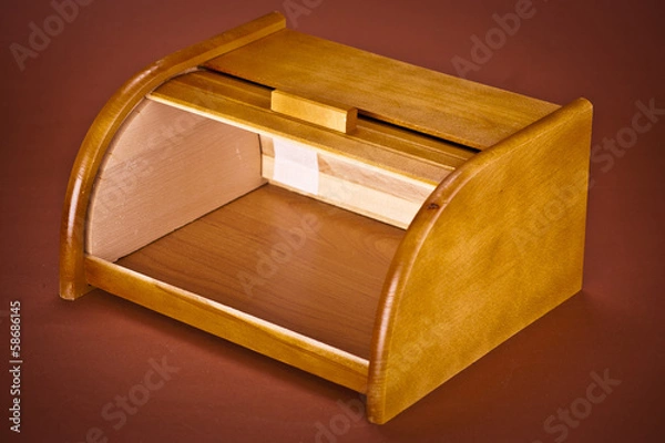Obraz  wooden bread box on brown backgroud
