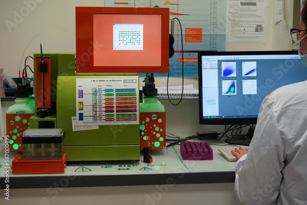 Fototapeta Research on chronic bacterial infections within PhD student working on brucellosis bacteria with the help of a flow cytometer.