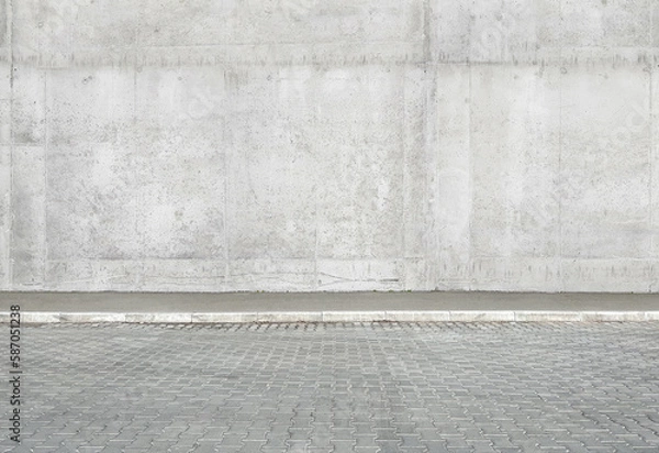 Obraz a fragment of a street city concrete wall of a building and an paving stones. Building's facade. Mocap or background for creativity