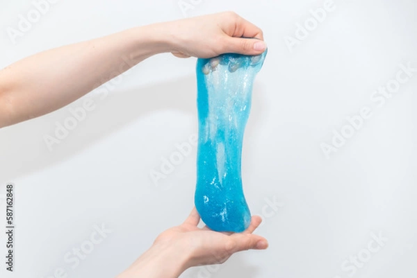 Obraz 青いスライムをのばす女性の手