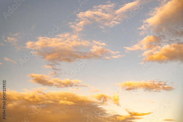 Obraz White clouds with yellow sunset light sky