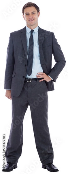 Fototapeta Smiling businessman with hand on hip