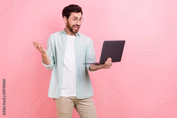 Fototapeta Photo of young project manager successful man wear smart casual outfit online meet conference colleagues isolated on pink color background