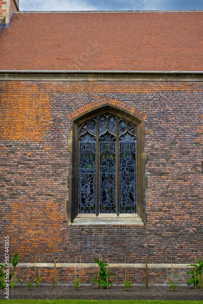 Fototapeta Beautiful stained glass in medieval window architecture at a historical college in Cambridge
