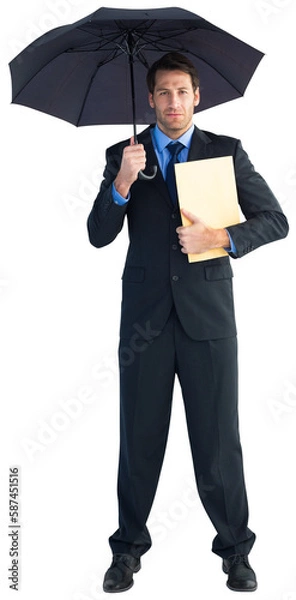 Fototapeta Businessman standing under umbrella while holding folder