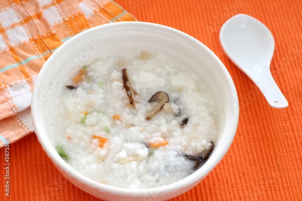 Obraz Chinese dimsum porridge with sliced mushrooms and vegetables