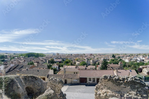 Obraz Panoramic view of the medieval village of Turegano on a spring day with blue sky. Segovia. Spain. 