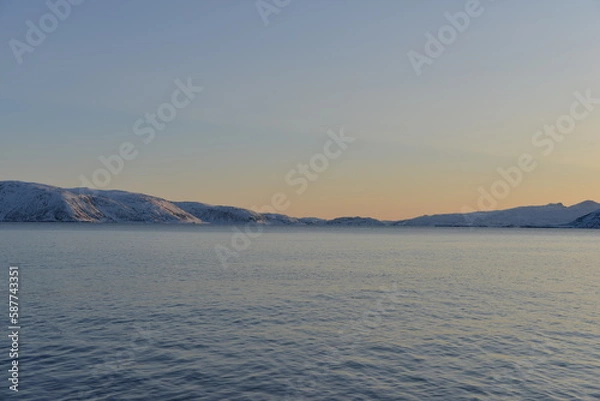 Fototapeta Mountains in the northern part of Norway, at the outlet to the ocean. Incredible sunset