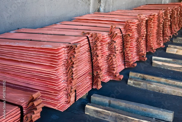 Fototapeta Copper cathodes after fire refining, electrolytic refining and
casting. Copper concentrates produced by mines are sold to smelters and refiners who treat the ore and refine the copper and charge.