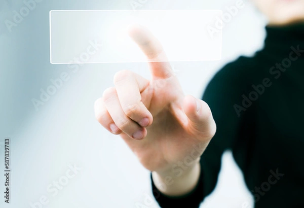 Fototapeta Woman using futuristic digital interface display