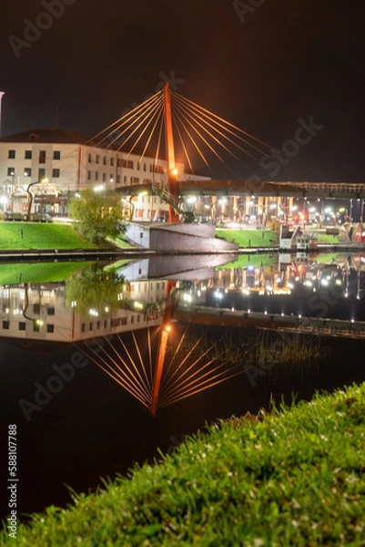 Fototapeta Bridge above the river in the night