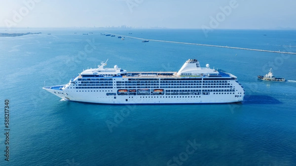 Fototapeta Cruise Ship, Cruise Liners beautiful white cruise ship above luxury cruise in the ocean sea at early in the morning time concept exclusive tourism travel on holiday take a vacation time on summer