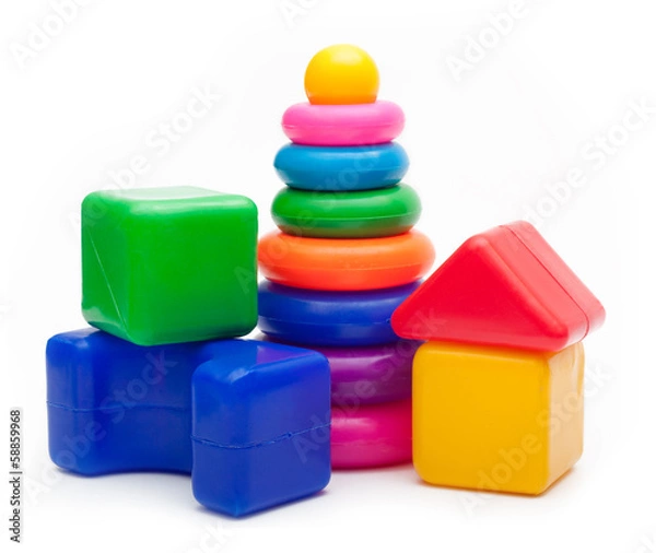 Fototapeta Toys isolated on white background. Pyramid build from colored