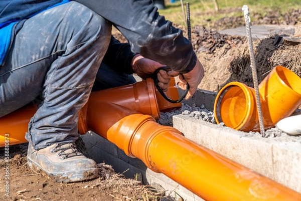 Obraz PVC plastic pipe for sewerage in the ground