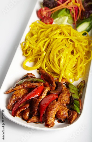 Fototapeta Grilled Chicken with Soy Sauce Linguine Pasta and Green Salad White Background