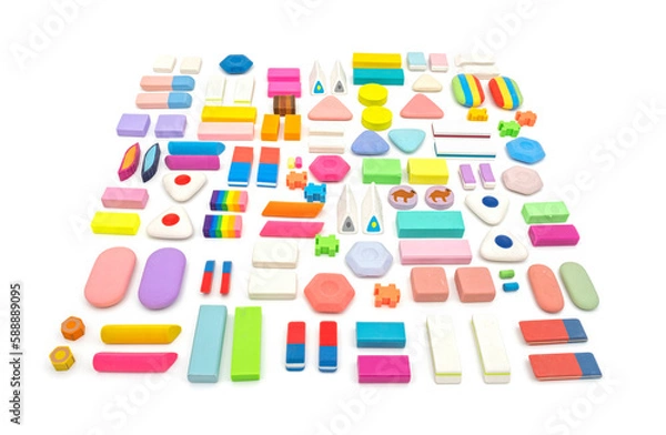 Fototapeta various shapes and colors of erasers arranged isolated on white background