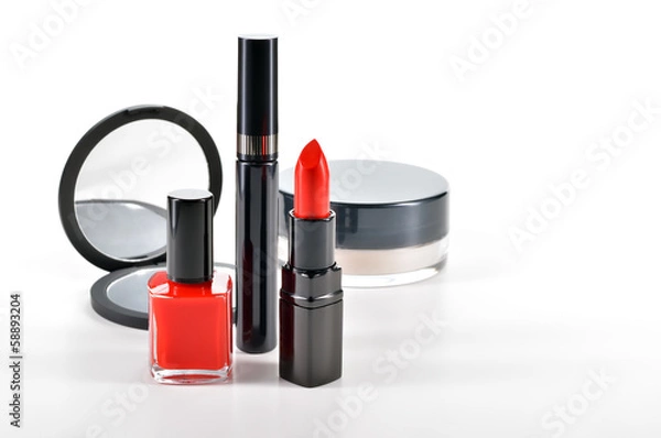Fototapeta Basic red makeup cosmetics on white background.