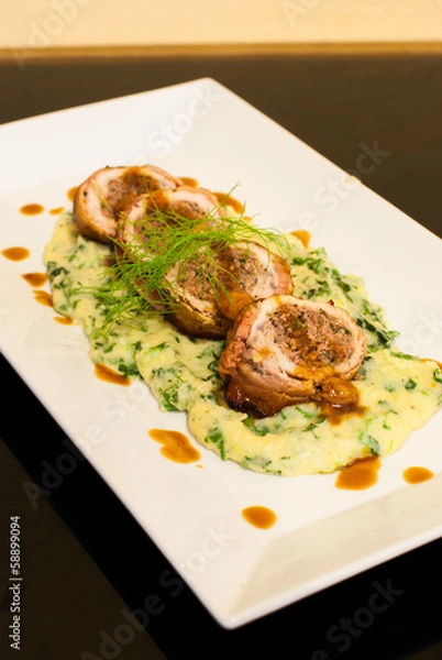 Fototapeta Bacon wrap pork stuff with seafood spinach mashed potato
