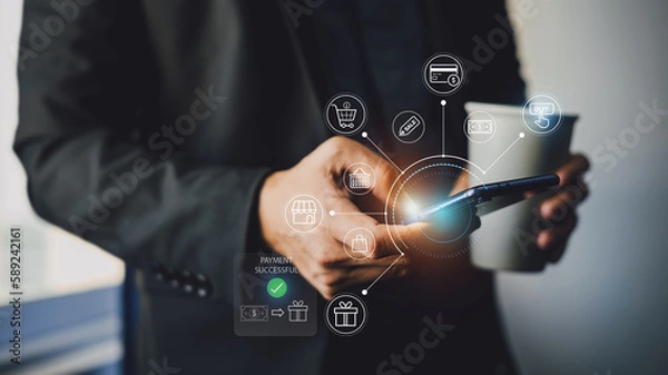 Fototapeta Person with mobile smartphone in hand paying online and online shopping with internet banking application.