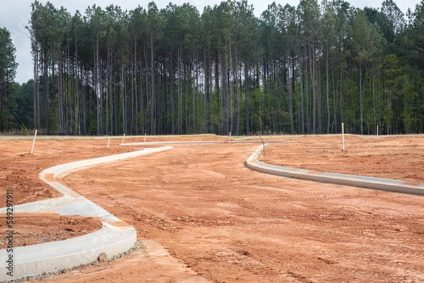 Obraz New home residential subdivision development of roads and curbs