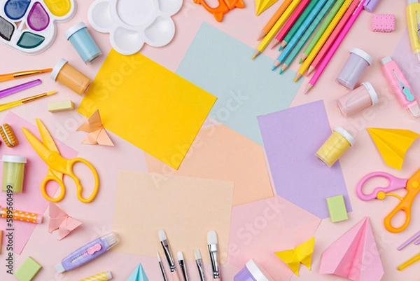 Fototapeta Pink pastel background with various colorful material for creativity and art activity.  Stationery and supplies for drawing and craft with .copy space.  Primary School or kindergarten.