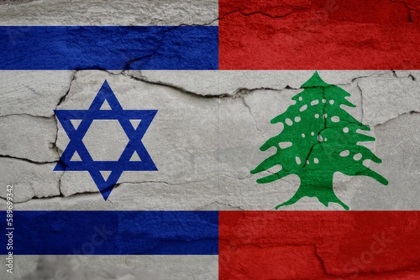 Fototapeta Israel Lebanon war. Flags of Israel and Palestine on cracked stone background. Concept of the Conflict between Israel and the Palestinian Authorities. Fire flame. Out of focus