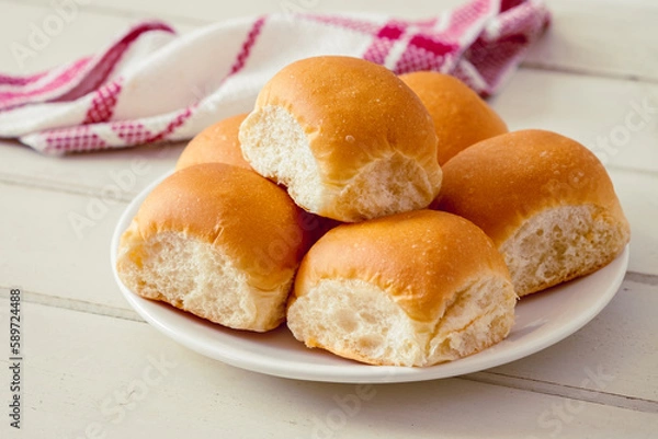 Fototapeta Soft bread rolls on white plate