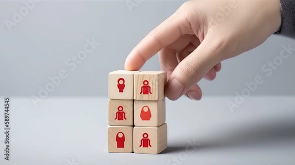 Fototapeta Attracting online customer and lead generation concept. Digital inbound marketing, customer retention strategy.Hand hold wooden cube with the icon big magnet to attract many people on grey background