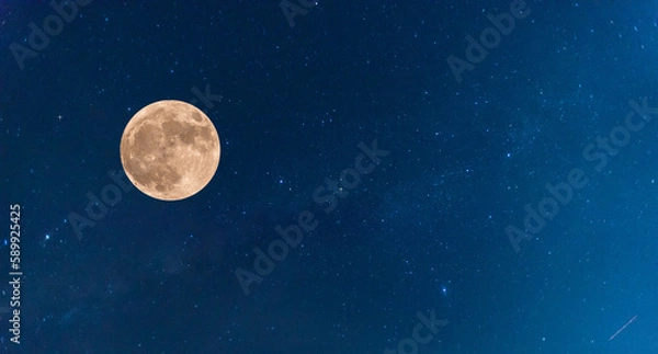 Fototapeta moon on dark blue night sky background, starry universe, nebula and galaxies with noise and grainy, selective focus.Earth's Moon Glowing On Black Background.