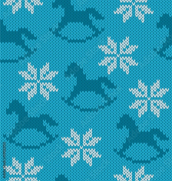Fototapeta Knitted background with image of snowflakes and horses