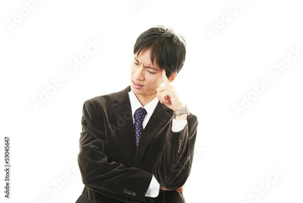 Fototapeta 苦悩するビジネスマン