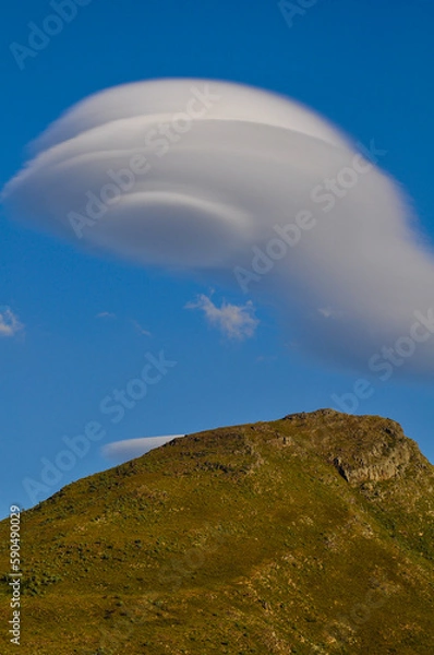 Fototapeta UFO or just a cloud?