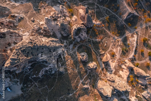 Fototapeta Aerial top view from drone Uchisar castle at sunset Cappadocia Turkey