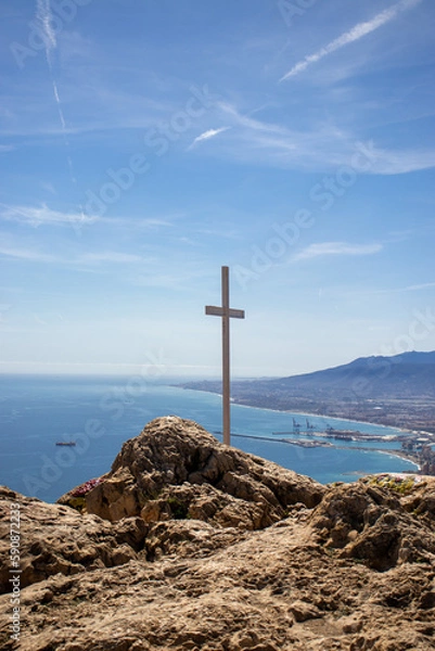 Fototapeta cross on the top of the mountain