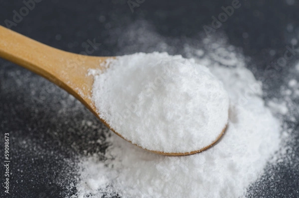 Obraz Sodium bicarbonate in a wooden spoon