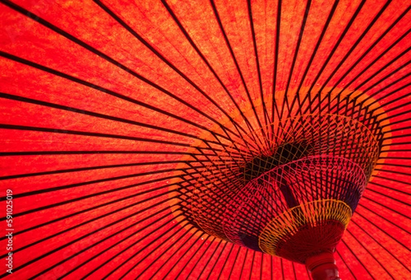 Fototapeta Design details underneath a red Japanese umbrella. In a Japanese restaurant in Auckland.