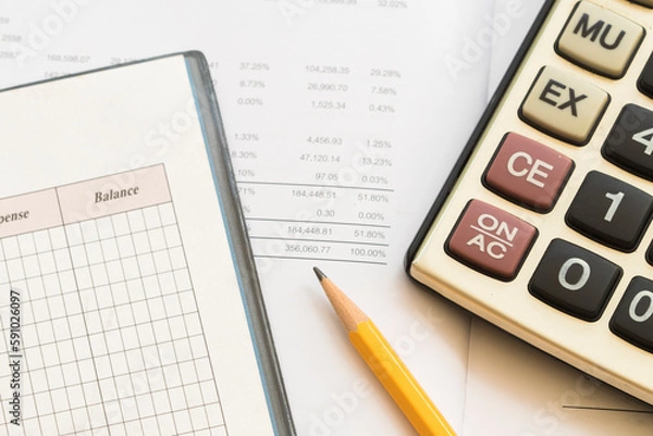 Fototapeta calculator, statement balance sheet accounting for business work arrangement flat lay style on background white 