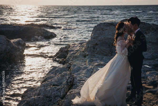 Fototapeta 海でウェディング