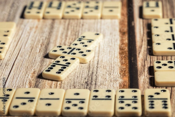 Fototapeta a group of domino blocks are laid out on a table