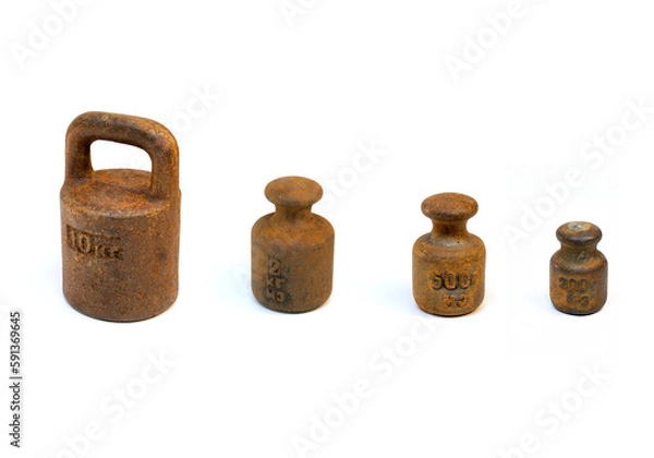 Fototapeta Ancient rusty various types  weights on white background